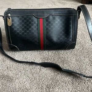 Gucci Black Shoulder Bag with Gold Accents